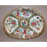 A 19TH CENTURY CHINESE ROSE MEDALLION CANTON PORCELAIN DISH, painted with figural and floral panels,