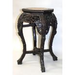 A LATE 19TH CENTURY CHINESE CARVED HARDWOOD MARBLE-TOP STAND, with carved foliate frieze, 2ft x 1ft.