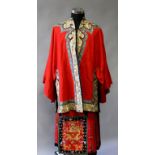 AN EARLY 20TH CENTURY CHINESE EMBROIDERED LADIES RED FELT JACKET & SKIRT, together with blue silk