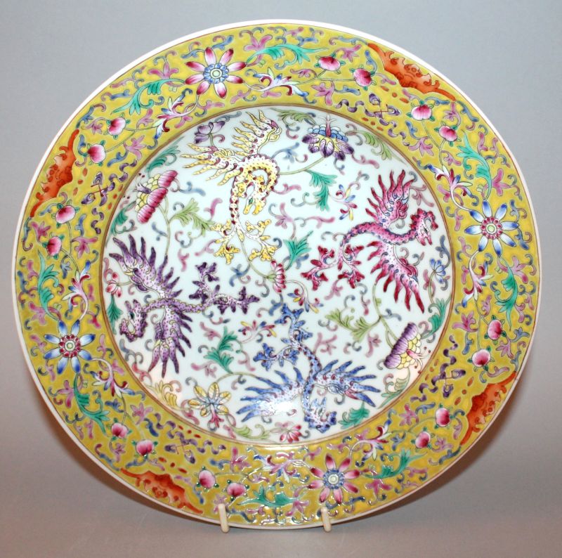 A GOOD QUALITY CHINESE FAMILLE ROSE PORCELAIN PHOENIX DISH, the interior painted in vivid enamels