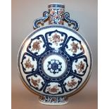 A GOOD LARGE CHINESE UNDERGLAZE-BLUE & COPPER-RED PORCELAIN MOON FLASK, each side decorated with