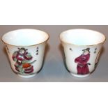 A PAIR OF CHINESE FAMILLE ROSE PORCELAIN CUPS, each decorated with legendary figures and panels of