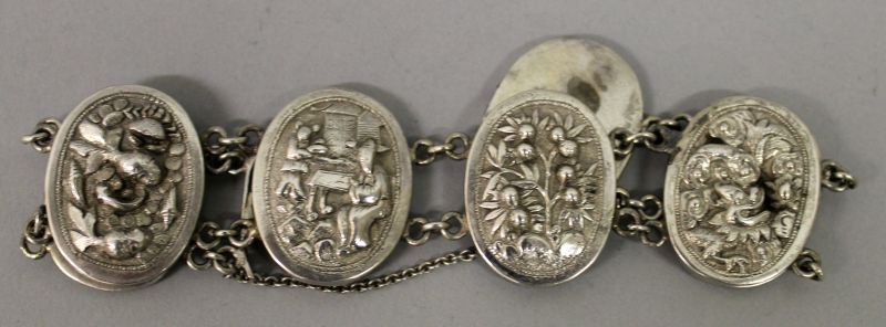 AN UNUSUAL SILVER-METAL BRACELET, in the form of dimes onlaid with auspicious Chinese characters, - Image 3 of 4