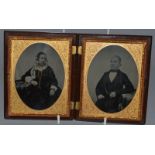 A PAIR OF FOLDING DAGUERREOTYPES IN A SUPERB CASE, many figures dancing 5ins x 4ins.