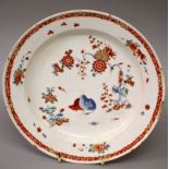 AN 18TH CENTURY BOW PLATE painted with the Quail pattern in Kakiemon style (chips).