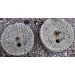 A PAIR OF SMALL MILLSTONES. 1ft 1ins diameter.