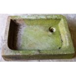 AN OLD CARVED SANDSTONE SINK. 2ft 9ins long x 2ft 1ins wide.