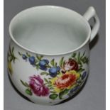 AN 18TH CENTURY WORCESTER BELL SHAPE COFFEE CUP with wishbone painted with a large flower sprays.