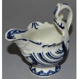 AN 18TH CENTURY DERBY DOLPHIN MOULDED EWER, painted in blue, highlighting the shell moulding.