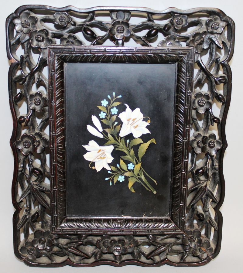 A GOOD 19TH CENTURY PIETRA DURA INLAID MARBLE PLAQUE, 17cms x 11cms in a pierced Chinese hardwood