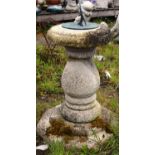 A RECONSTITUTED STONE BALUSTER SHAPE SUNDIAL. 2ft 2ins high.