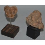 TWO SMALL TERRACOTTA ANTIQUITIES.