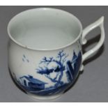AN 18TH CENTURY WORCESTER BELL SHAPE COFFEE CUP with wishbone handle, painted with two Chinese