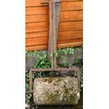 AN OLD GARDEN ROLLER with wrought iron handle. 3ft 4ins high.