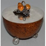 AN UNUSUAL .800 SILVER MOUNTED WOODEN BOWL, the top with hazelnuts and silver walnut feet 6ins