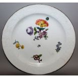 A MEISSEN CIRCULAR PLATE, white ground painted with flowers Cross swords mark in blue 11ins