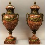 A SUPERB PAIR OF 19TH CENTURY ROUGE MARBLE AND ORMOLU TWO HANDLED URNS AND COVERS with ribbons and