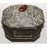 A VERY HEAVY OCTAGONAL BOX AND COVER, the lid decorated in fruiting vines with panelled sides. 5.