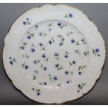 A SEVRES BLUE AND WHITE PLATE painted with cornflowers Mark in blue. 9.5ins diameter.