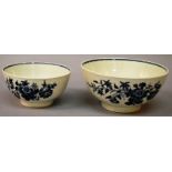 A PAIR OF 18TH CENTURY WORCESTER GRADUATED BOWLS decorated in blue with butterflies and floral