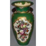 AN 18TH CENTURY WORCESTER VASE painted with fruit in mirror shaped panels on an apple green ground.