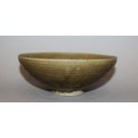 ANOTHER CHINESE SONG DYNASTY PORCELAIN BOWL, possibly Yaozhou, the interior with simple carved