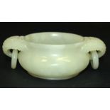 A GOOD QUALITY CHINESE JADE CENSER, with floral carved and loose ring handles, the stone of