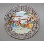 A CHINESE FAMILLE ROSE EUROPEAN-SUBJECT PORCELAIN DISH, the base with a Qianlong seal mark, 8.8in