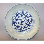 A LARGE 16TH CENTURY CHINESE MING DYNASTY JIAJING MARK & PERIOD BLUE & WHITE PORCELAIN DISH, the