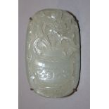 A GOOD QUALITY 18TH/19TH CENTURY CHINESE CARVED OVAL CELADON JADE PLAQUE, the rounded upper