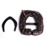 AN OVERSHOE AND A HEAVY HORSESHOE.  19th century. Exceptionally scarce. This wood and iron shoe
