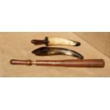 TWO DRENCHING HORNS AND A WOODEN BALLING GUN. Both horns early 19th century, one with wooden handle.