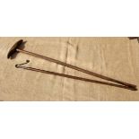 A WOODEN SHEEP DIP HOOK AND A LEG CROOK. Late 19th/early 20th century.