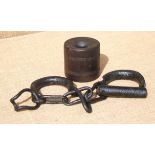 A PAIR OF IRON HORSE SHACKLES AND A LIGNUM VITAE TETHERING CHOG. Both 19th century. West Country