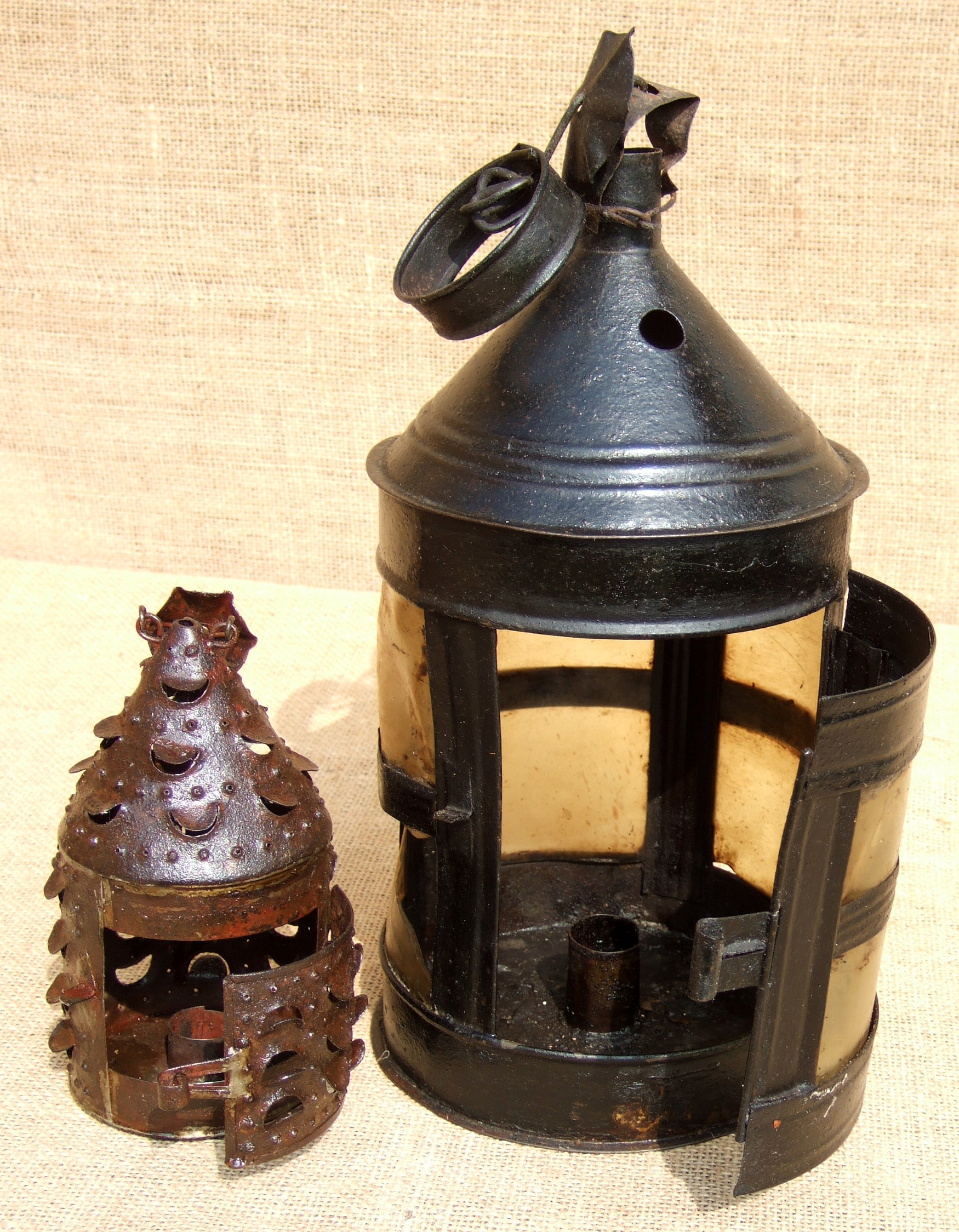 A HORN LANTERN AND A TINKER’S MINIATURE LAMP. Both 19TH century. Part of one horn ‘pane’ in the