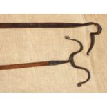 A SHEEP LEG CROOK, AND A DIP HOOK. Both 19th century. The 2m long dip hook doubles as a neck crook
