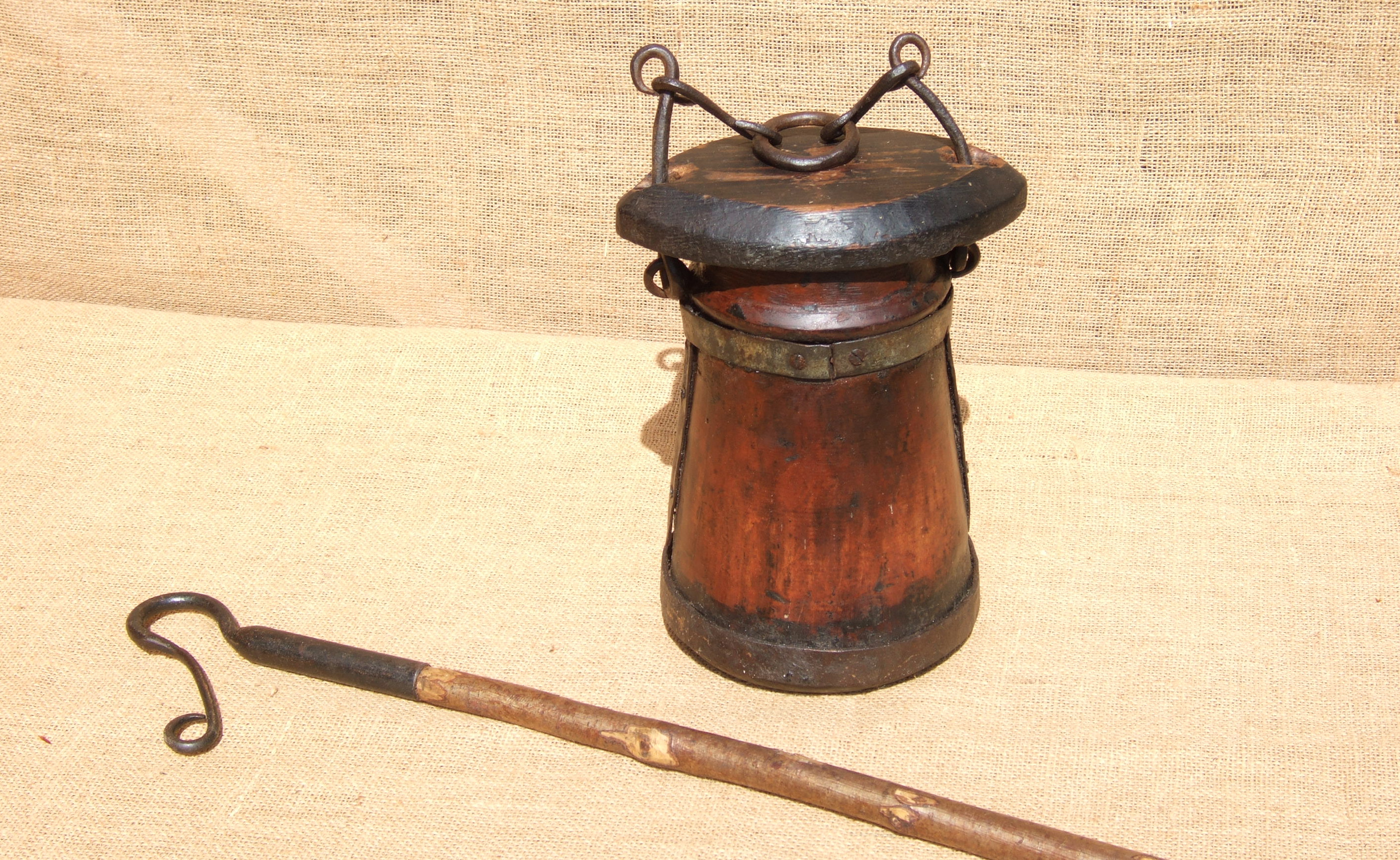 A SUSSEX SHEPHERD’S TAR POT. Late18th/early 19th century. Carved from solid wood 31cm ht. Very