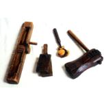 FOUR WOODEN BIRD SCARERS. Assorted wooden clappers and rattles, 19th century. The heavy rattle is