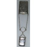 A GEORGE V SILVER ENGRAVED CIGARETTE CASE, Birmingham 1918, and MATCHING VESTA on a chain.