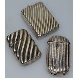 A VICTORIAN SILVER RIBBED VESTA, Birmingham 1888, and TWO OTHERS, Birmingham 1891, and UNMARKED (