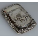 A STERLING SILVER VESTA with two game dogs in relief and engraved. America 1902.