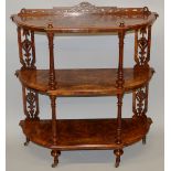 A VICTORIAN FIGURED WALNUT THREE TIER WHAT-NOT with inlay and fluted columns, turned legs and