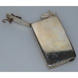 A PLAIN VICTORIAN SILVER RECTANGULAR MATCHBOX WITH STRIKER. Birmingham 1889 Maker: H.J.