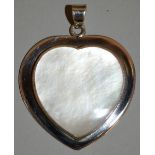 A MOTHER-OF-PEARL PENDANT.