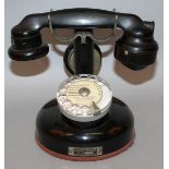 A FRENCH BLACK BAKELITE TELEPHONE.