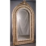 A LARGE UPRIGHT WHITE AND GILT FRAMED MIRROR with bevelled mirrored panel. 7ft high, 3ft 5ins wide.