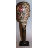 A RARE CARVED WOOD AND POLYCHROME HEAD, Possibly EUROPEAN OR INDONESIAN INFLUENCE on a stand 13ins