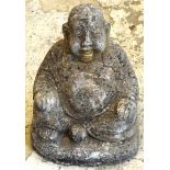 A RECONSTITUTED STONE GARDEN ORNAMENT modelled as a seated  Buddha 15ins high.