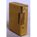 A DUPONT GOLD COLOURED GAS LIGHTER, No. EM 1723.