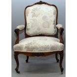 A GOOD 18TH CENTURY FRENCH BEECH WOOD ARMCHAIR with padded back, arms and seat supported on